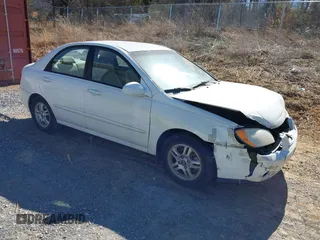 2005 Kia Spectra LX with VIN KNAFE121855125651, listed as a IAAI auction lot 41829234 with 184,340 mi miles. Bid and sale history available at carsss.com. Image 1.