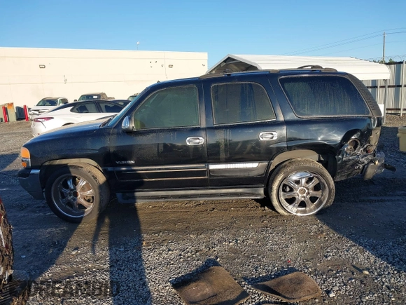 2002 GMC Yukon SLT with VIN 1GKEC13Z42J245768, listed as a IAAI auction lot 41769081 with 389,189 mi miles. Bid and sale history available at carsss.com. Image 14.