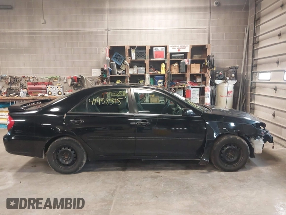 2003 Toyota Camry LE with VIN 4T1BE32K33U171859, listed as a IAAI auction lot 41938515 with 213,447 mi miles and . Bid and sale history available at DreamBid. Image 14.