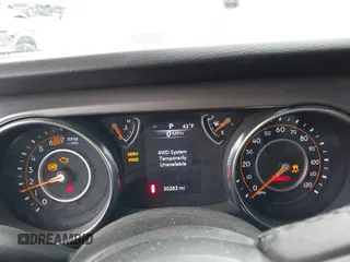 2023 Jeep Wrangler Sport with VIN 1C4HJXDG4PW541155, listed as a IAAI auction lot 41651222 with 30,283 mi miles and . Bid and sale history available at DreamBid. Image 7.