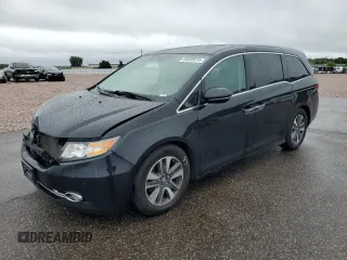 2015 Honda Odyssey Touring Elite with VIN 5FNRL5H97FB063749, listed as a Copart auction lot 64835015 with 165,552 mi miles and Salvage title. Bid and sale history available at DreamBid. Image 1.