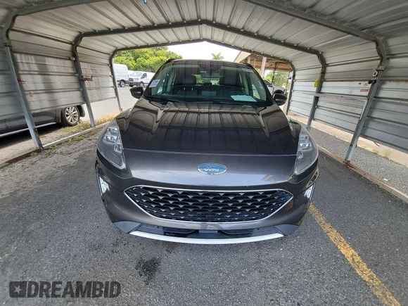 2020 Ford Escape Titanium Hybrid with VIN 1FMCU0DZ2LUB82013, listed as a IAAI auction lot 42727391 with 92,623 mi miles and . Bid and sale history available at DreamBid. Image 11.