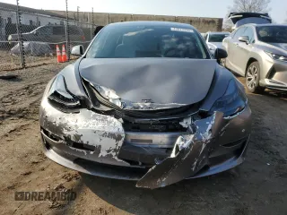 2022 Tesla Model 3 Long Range with VIN 5YJ3E1EBXNF272496, listed as a Copart auction lot 43973435 with 28,450 mi miles and Salvage Title. Bid and sale history available at DreamBid. Image 5.