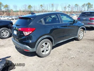 2016 Honda HR-V EX-L w/Navi with VIN 3CZRU6H71GM760696, listed as a IAAI auction lot 41830868 with 129,243 mi miles. Bid and sale history available at carsss.com. Image 4.