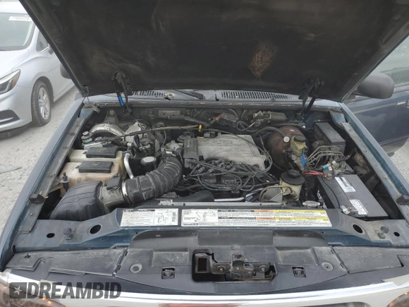 1998 Ford Explorer XLT with VIN 1FMZU32P0WUD21265, listed as a Copart auction lot 73702364 with 211,096 mi miles and Salvage title. Bid and sale history available at DreamBid. Image 12.