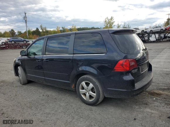 2010 Volkswagen Routan SE with VIN 2V4RW3D11AR262729, listed as a Copart auction lot 74123174 with 189,237 mi miles and Salvage Title. Bid and sale history available at carsss.com. Image 2.