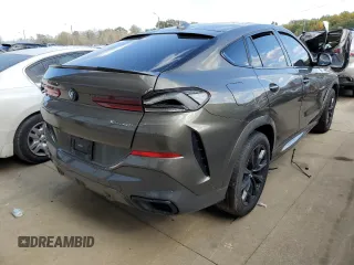 2020 BMW X6 xDrive40i z VIN 5UXCY6C07L9C74754, wystawiony jako Copart lot #62235632 z przebiegiem Nie podano mil oraz . Historia ofert i sprzedaży dostępna na DreamBid. Obrazek 4.