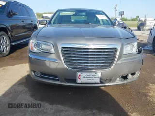 2014 Chrysler 300 with VIN 2C3CCAAG4EH159911, listed as a IAAI auction lot 41963042 with 105,972 mi miles and . Bid and sale history available at DreamBid. Image 12.