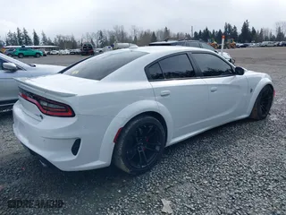 2021 Dodge Charger SRT Hellcat Widebody with VIN 2C3CDXL97MH632150, listed as a IAAI auction lot 41783003 with 11,681 mi miles. Bid and sale history available at carsss.com. Image 4.