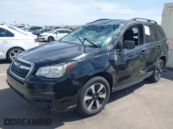 2017 Subaru Forester with VIN JF2SJABC5HH450342, listed as a IAAI auction lot 41872990 with 98,924 mi miles. Bid and sale history available at carsss.com. Image 2.