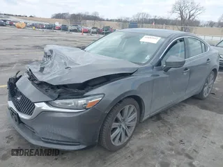 2020 Mazda 6 Grand Touring with VIN JM1GL1TY6L1525169, listed as a IAAI auction lot 41683512 with 73,313 mi miles and . Bid and sale history available at DreamBid. Image 17.