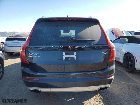2016 Volvo XC90 T6 Momentum with VIN YV4A22PK0G1052182, listed as a Copart auction lot 89309885 with 141,478 mi miles and Clean Title. Bid and sale history available at carsss.com. Image 6.