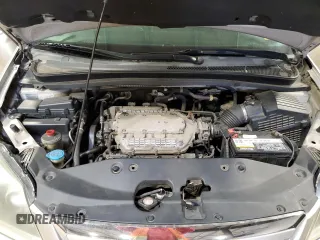 2007 Honda Odyssey Touring z VIN 5FNRL38887B102328, wystawiony jako Copart lot #52113595 z przebiegiem 105 394 mil mil oraz Szkoda całkowita • Salvage title. Historia ofert i sprzedaży dostępna na DreamBid. Obrazek 12.