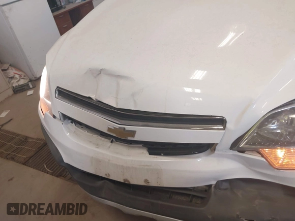 2014 Chevrolet Captiva Sport LS with VIN 3GNAL2EK9ES648395, listed as a IAAI auction lot 42261664 with 128,360 mi miles and . Bid and sale history available at DreamBid. Image 6.