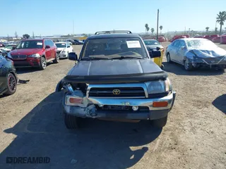 1997 Toyota 4Runner Limited with VIN JT3GN87R1V0048198, listed as a IAAI auction lot 41826521 with 253,294 mi miles. Bid and sale history available at carsss.com. Image 13.