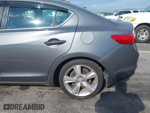 2014 Acura ILX z VIN 19VDE1F39EE002881, wystawiony jako IAAI lot #42270605 z przebiegiem 172 356 mil mil oraz . Historia ofert i sprzedaży dostępna na DreamBid. Obrazek 20.