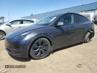 2024 Tesla Model Y Long Range z VIN 7SAYGDEE9RF129530, wystawiony jako Copart lot #53506685 z przebiegiem Nie podano mil oraz Czysty tytuł • Clean title. Historia ofert i sprzedaży dostępna na DreamBid. Obrazek 1.