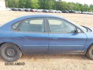 2004 Ford Taurus LX z VIN 1FAFP52U64A114884, wystawiony jako IAAI lot #42212573 z przebiegiem 106 402 mil mil oraz . Historia ofert i sprzedaży dostępna na DreamBid. Obrazek 13.