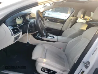 2018 BMW 7 Series 740i with VIN WBA7E2C51JG741931, listed as a Copart auction lot 76929173 with 63,169 mi miles. Bid and sale history available at carsss.com. Image 7.