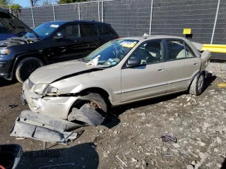 2000 Mazda Protege DX z VIN JM1BJ2220Y0197585, wystawiony jako Copart lot #65309404 z przebiegiem Nie podano mil oraz Nie do naprawy • Non repairable. Historia ofert i sprzedaży dostępna na DreamBid. Obrazek 1.