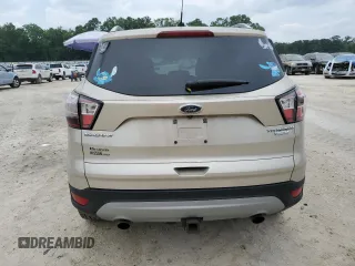 2017 Ford Escape Titanium with VIN 1FMCU0J95HUB96659, listed as a Copart auction lot 54053775 with 69,744 mi miles and Salvage Title. Bid and sale history available at DreamBid. Image 6.