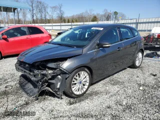 2015 Ford Focus Titanium with VIN 1FADP3N22FL360814, listed as a Copart auction lot 48492925 with 70,260 mi miles and Salvage Title. Bid and sale history available at carsss.com. Image 1.