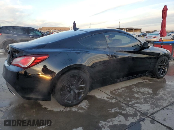 2013 Hyundai Genesis Coupe Track z VIN KMHHU6KJ1DU095159, wystawiony jako Copart lot #88560805 z przebiegiem 168 290 mil mil oraz Szkoda całkowita • Salvage title. Historia ofert i sprzedaży dostępna na DreamBid. Obrazek 3.