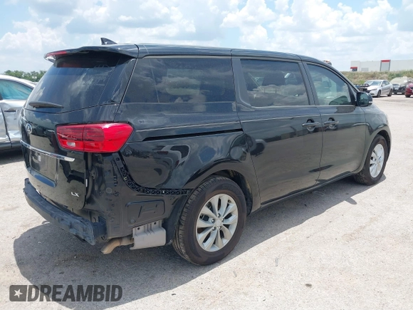 2020 Kia Sedona EX with VIN KNDMB5C19L6617993, listed as a IAAI auction lot 39711859 with 66,083 mi miles. Bid and sale history available at carsss.com. Image 4.