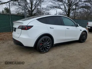 2022 Tesla Model Y Performance with VIN 7SAYGDEF7NF311990, listed as a Copart auction lot 43705395 with 25,651 mi miles and Salvage Title. Bid and sale history available at DreamBid. Image 3.