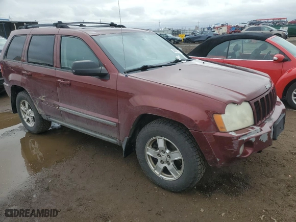 2007 Jeep Grand Cherokee Laredo with VIN 1J8HR48P27C525645, listed as a Copart auction lot 48421375 with 195,910 mi miles and Salvage Title. Bid and sale history available at carsss.com. Image 4.