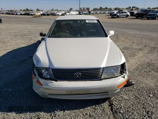 1995 Toyota Celica z VIN UCF210009608, wystawiony jako Copart lot #76088044 z przebiegiem 127 989 mil mil oraz Szkoda całkowita • Salvage title. Historia ofert i sprzedaży dostępna na DreamBid. Obrazek 5.