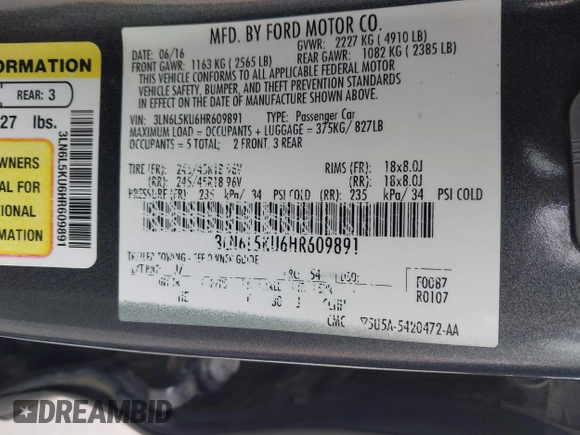 2017 Lincoln MKZ Hybrid Premiere with VIN 3LN6L5KU6HR609891, listed as a IAAI auction lot 41712359 with 112,349 mi miles. Bid and sale history available at carsss.com. Image 9.
