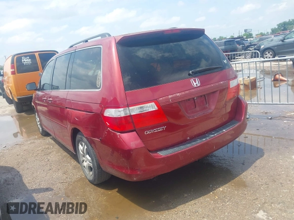 2006 Honda Odyssey EX-L with VIN 5FNRL38606B426919, listed as a IAAI auction lot 42077458 with 125,161 mi miles and . Bid and sale history available at carsss.com. Image 3.