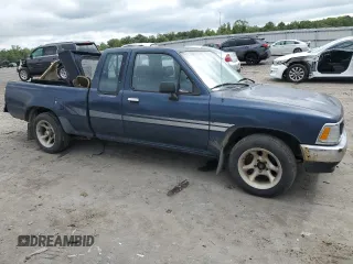 1994 Toyota Pickup DX with VIN JT4RN93P7R5098658, listed as a Copart auction lot 70644624 with 137,379 mi miles and Salvage title. Bid and sale history available at DreamBid. Image 4.