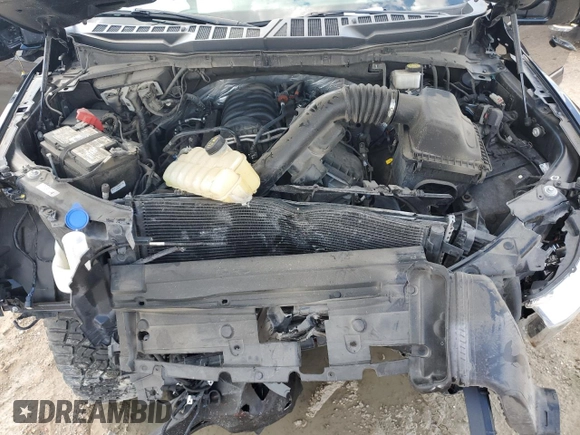 2021 Ford F-150 XL with VIN 1FTFW1E5XMFB70288, listed as a Copart auction lot 52735033 with 35,111 mi miles and Salvage Title. Bid and sale history available at carsss.com. Image 11.