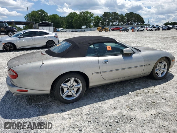 1999 Jaguar XK z VIN SAJGX2049XC034022, wystawiony jako Copart lot #55690025 z przebiegiem Nie podano mil oraz Tytuł czysty. Historia ofert i sprzedaży dostępna na DreamBid. Obrazek 3.