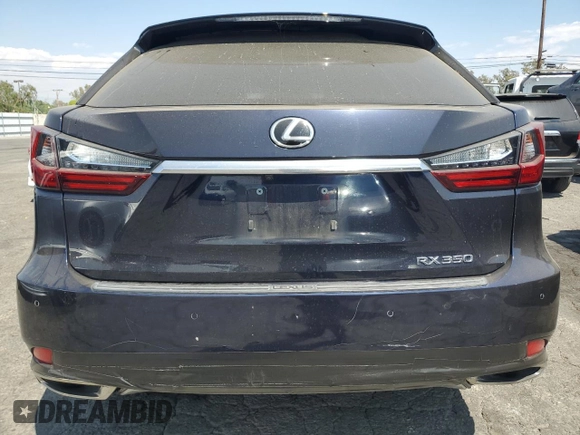 2020 Lexus RX with VIN 2T2AZMAA0LC164766, listed as a Copart auction lot 69867914 with 101,104 mi miles and Salvage Title. Bid and sale history available at carsss.com. Image 6.