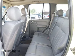 2005 Jeep Liberty Limited with VIN 1J4GL58K05W509884, listed as a IAAI auction lot 42245608 with 201,419 mi miles and . Bid and sale history available at DreamBid. Image 8.