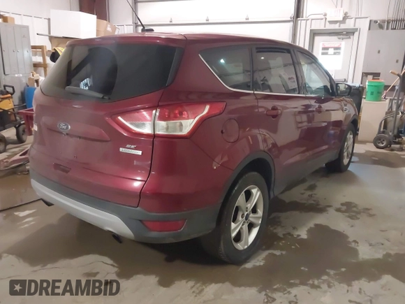 2015 Ford Escape SE with VIN 1FMCU0GXXFUC86876, listed as a IAAI auction lot 41727877 with 114,387 mi miles. Bid and sale history available at carsss.com. Image 4.