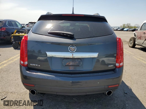 2012 Cadillac SRX Performance Collection with VIN 3GYFNEE34CS590058, listed as a Copart auction lot 54548545 with 122,070 mi miles and Salvage Title. Bid and sale history available at carsss.com. Image 6.