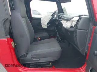 2006 Jeep Wrangler SE with VIN 1J4FA29156P762295, listed as a IAAI auction lot 41669950 with 163,492 mi miles and . Bid and sale history available at DreamBid. Image 8.
