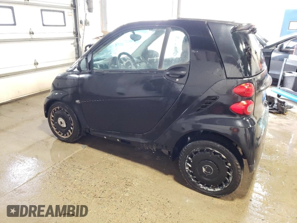 2009 Smart fortwo Pure with VIN WMEEJ31X99K280598, listed as a Copart auction lot 57480915 with 30,628 mi miles and Clean title. Bid and sale history available at DreamBid. Image 2.