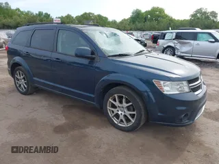 2013 Dodge Journey SXT with VIN 3C4PDDBG0DT566138, listed as a IAAI auction lot 42297536 with 135,775 mi miles and . Bid and sale history available at DreamBid. Image 1.