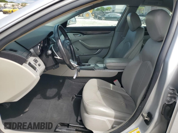 2009 Cadillac CTS RWD w/1SA with VIN 1G6DF577690145964, listed as a Copart auction lot 74073064 with 103,788 mi miles and Salvage Title. Bid and sale history available at carsss.com. Image 7.