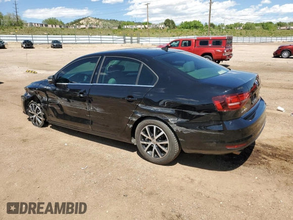 2017 Volkswagen Jetta SE with VIN 3VWDB7AJ4HM204110, listed as a Copart auction lot 57890655 with 82,817 mi miles and Salvage title. Bid and sale history available at DreamBid. Image 2.