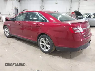 2015 Ford Taurus SEL z VIN 1FAHP2H88FG163179, wystawiony jako IAAI lot #42345579 z przebiegiem 142 424 mil mil oraz . Historia ofert i sprzedaży dostępna na DreamBid. Obrazek 3.