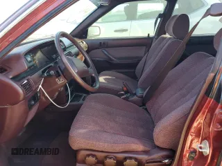 1988 Toyota Camry z VIN JT2SV21W9J0191632, wystawiony jako Copart lot #82323554 z przebiegiem 145 961 mil mil oraz Szkoda całkowita • Salvage title. Historia ofert i sprzedaży dostępna na DreamBid. Obrazek 7.