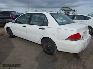 2004 Mitsubishi Lancer ES with VIN JA3AJ26E74U060371, listed as a IAAI auction lot 41636927 with 165,456 mi miles. Bid and sale history available at carsss.com. Image 3.