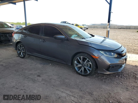 2021 Honda Civic Sport with VIN 19XFC2F80ME003634, listed as a Copart auction lot 52317715 with 69,411 mi miles and Salvage Title. Bid and sale history available at DreamBid. Image 4.