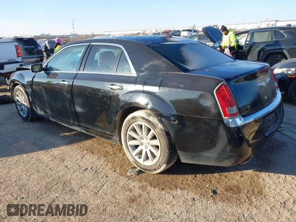 2011 Chrysler 300 Limited with VIN 2C3CA5CG2BH598580, listed as a IAAI auction lot 41330840 with 185,821 mi miles. Bid and sale history available at carsss.com. Image 3.